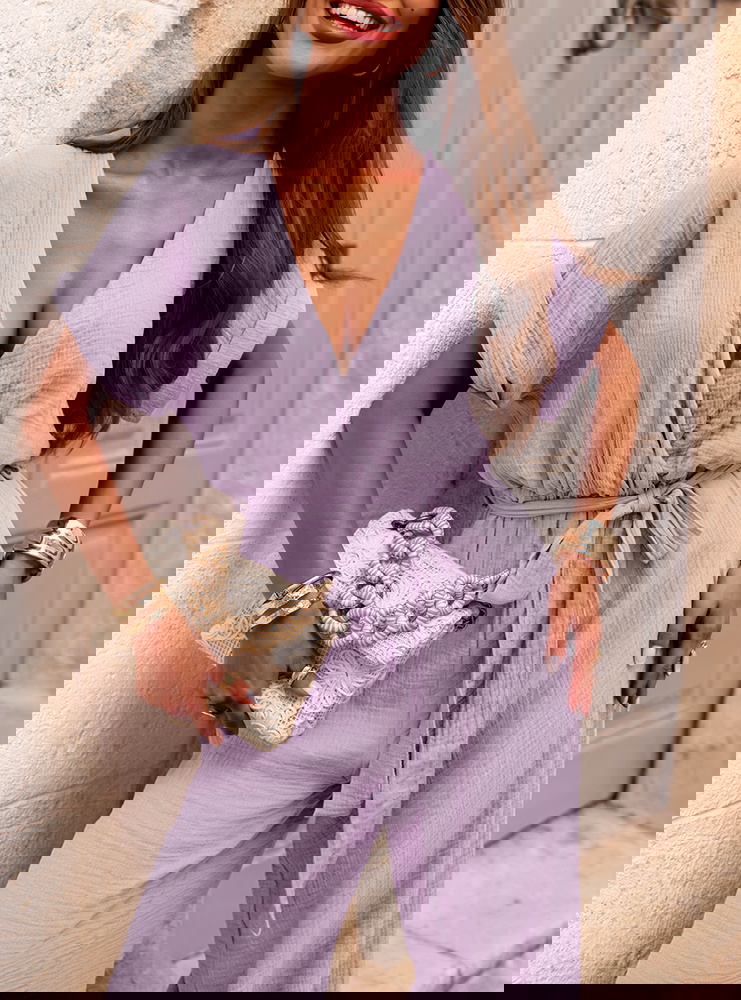 Liliowy kombinezon z długimi...