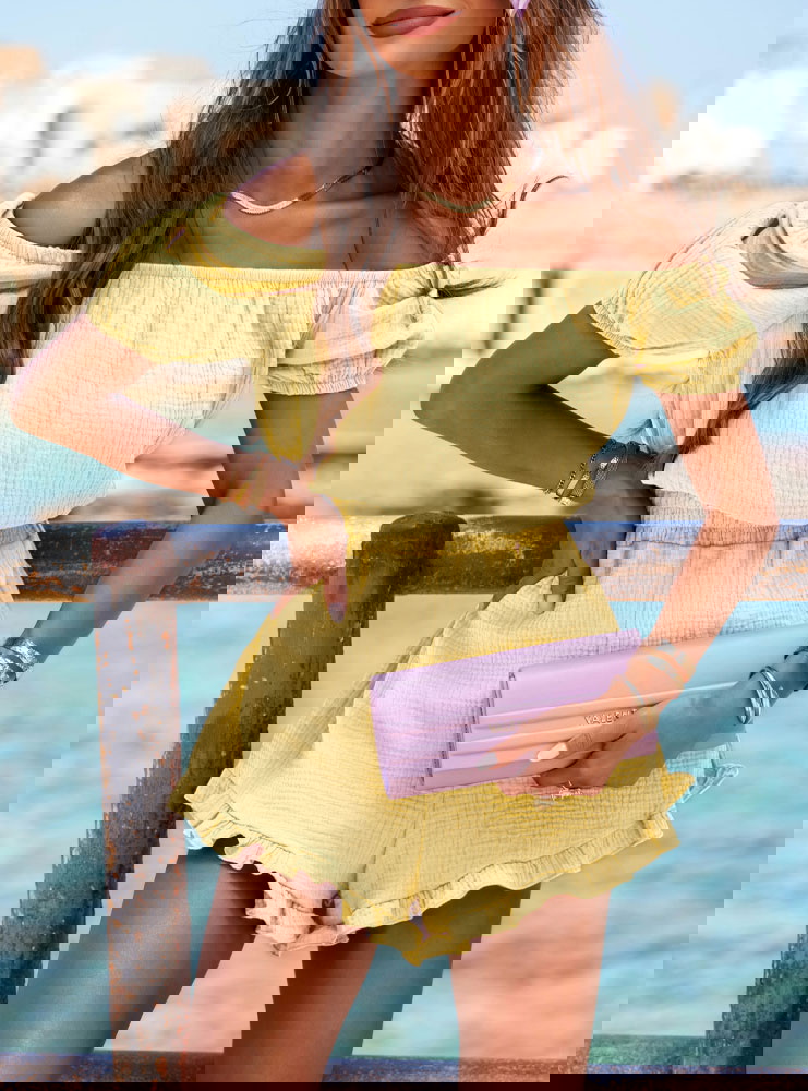 Muślinowy kombinezon z gumką w talii...