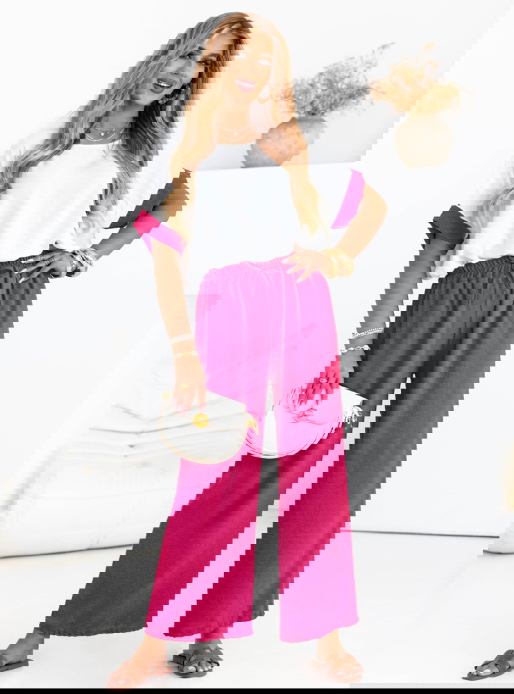 Różowy komplet bluzka i szerokie...