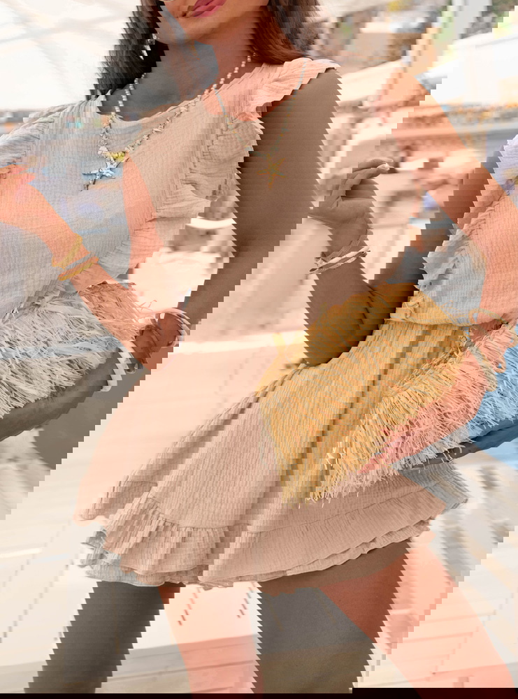 Beżowy muślinowy kombinezon jak...