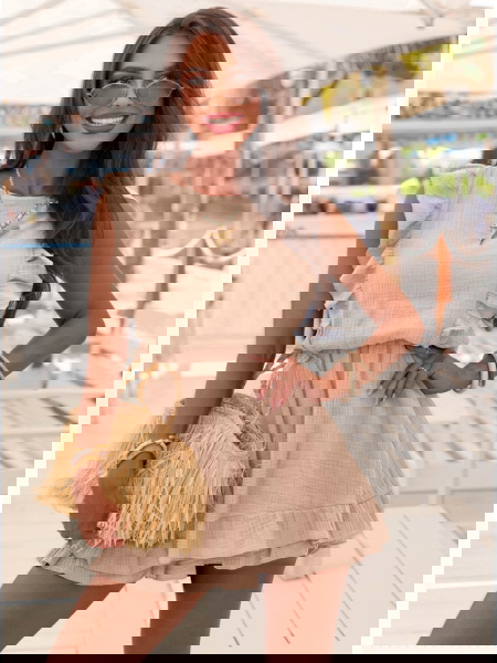 Beżowy muślinowy kombinezon...