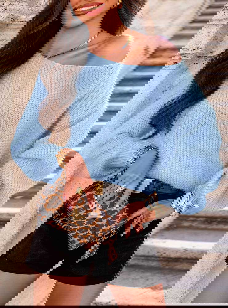 Błękitny sweter z wiązaniem na...