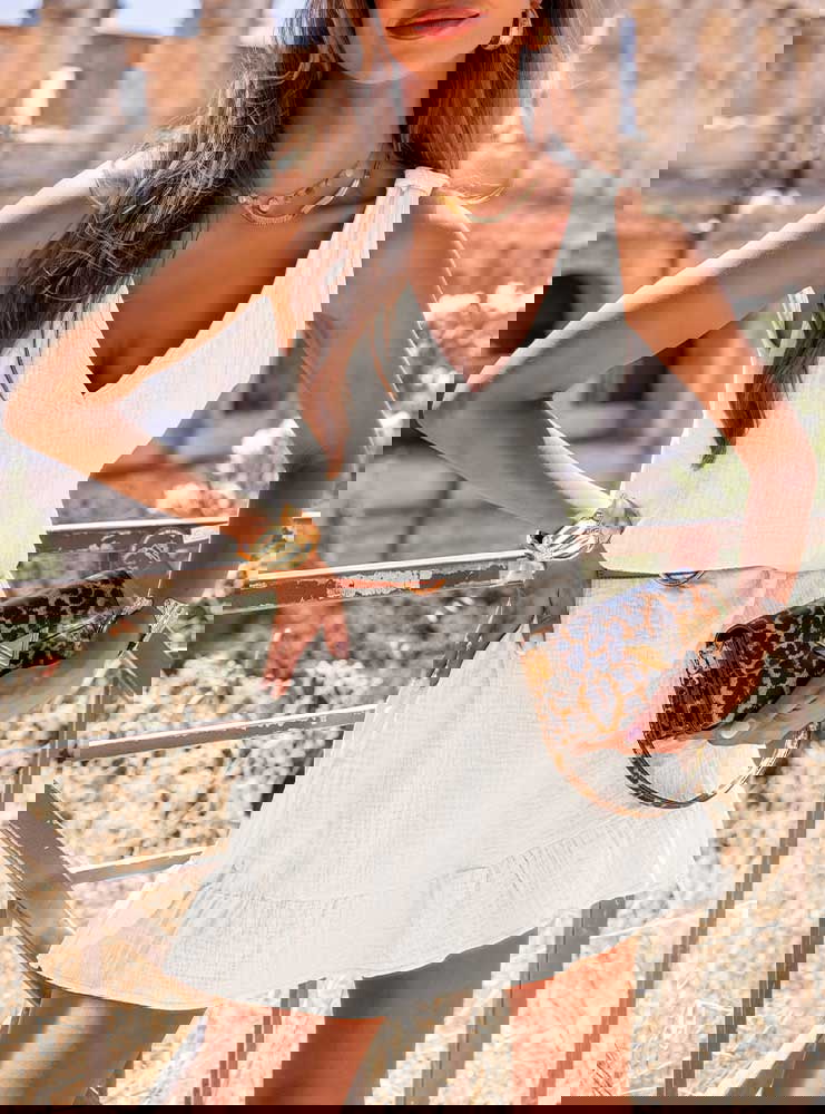 Biała muślinowa sukienka na...