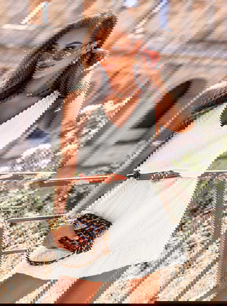 Biała muślinowa sukienka na...