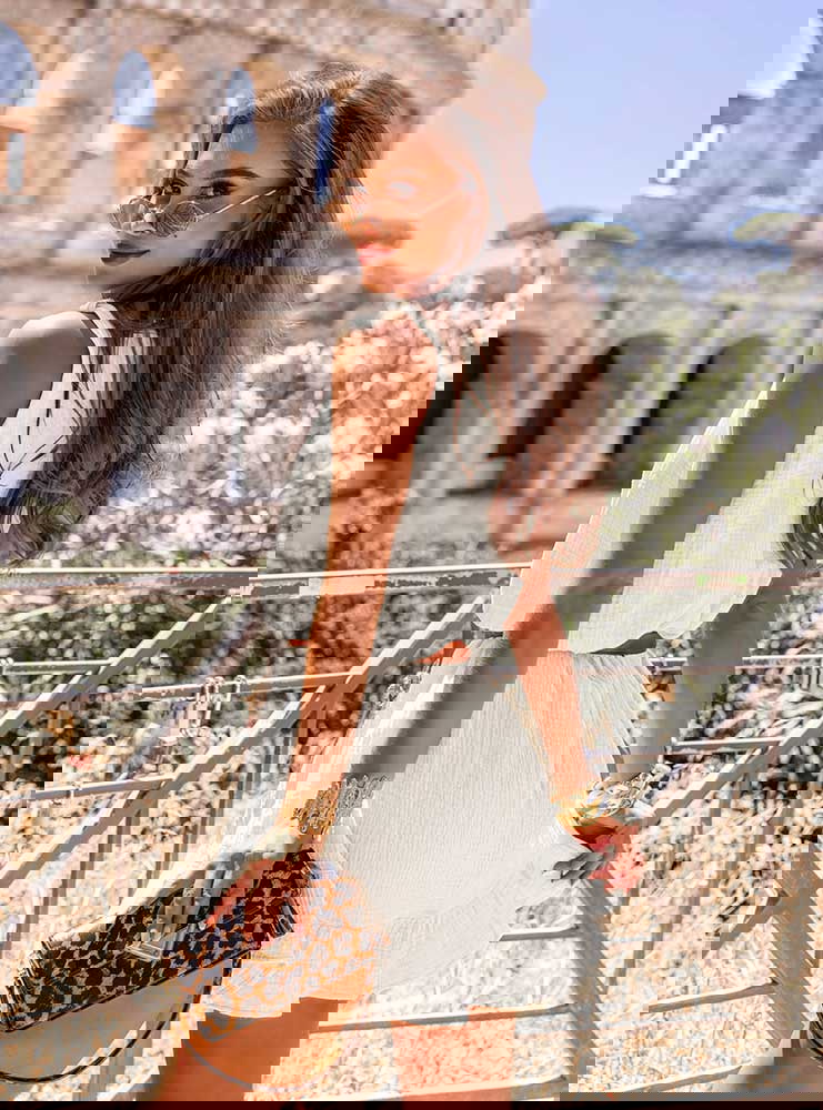 Biała muślinowa sukienka na...