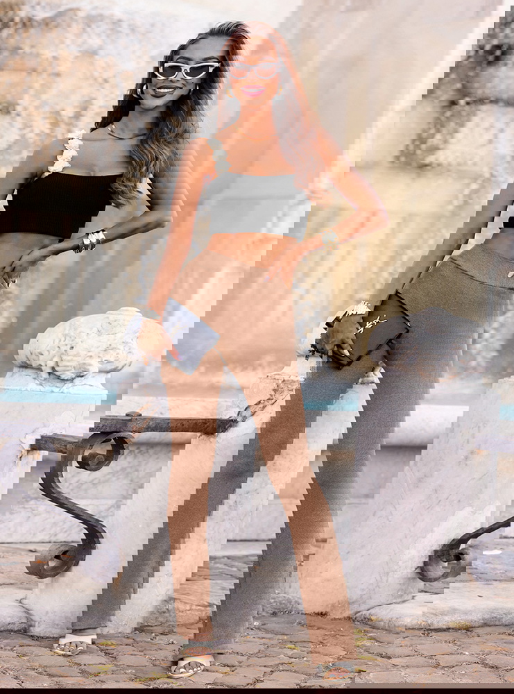 Beżowe prążkowane spodnie z...