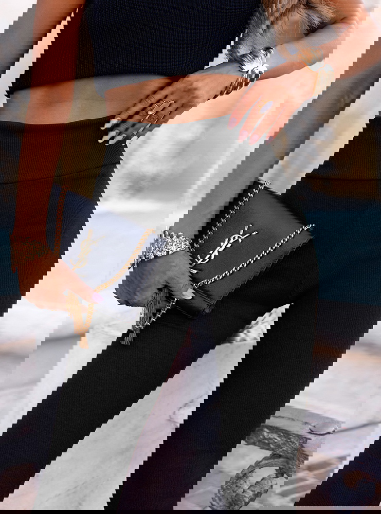 Czarne prążkowane spodnie z...