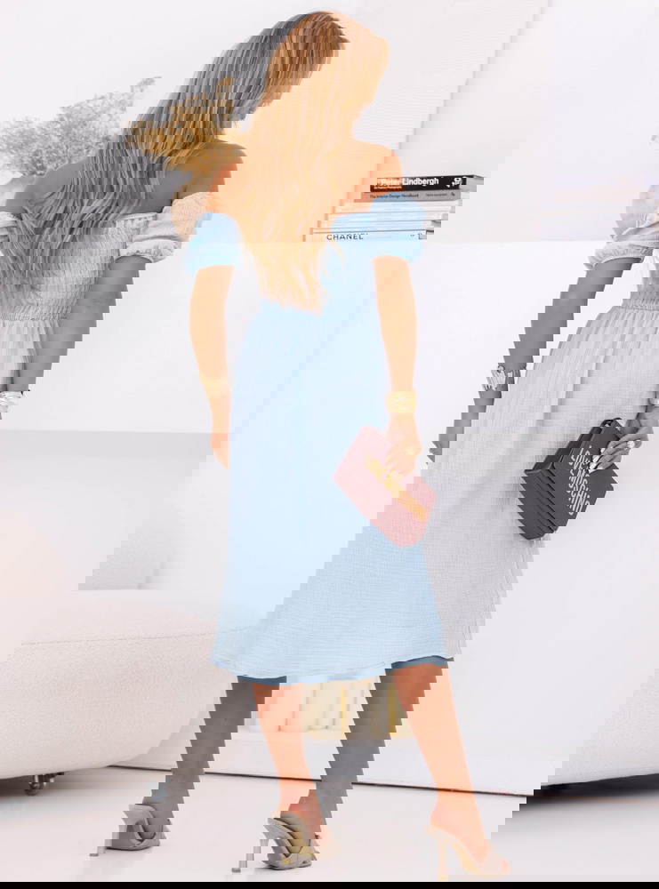 Błękitna muślinowa sukienka z...