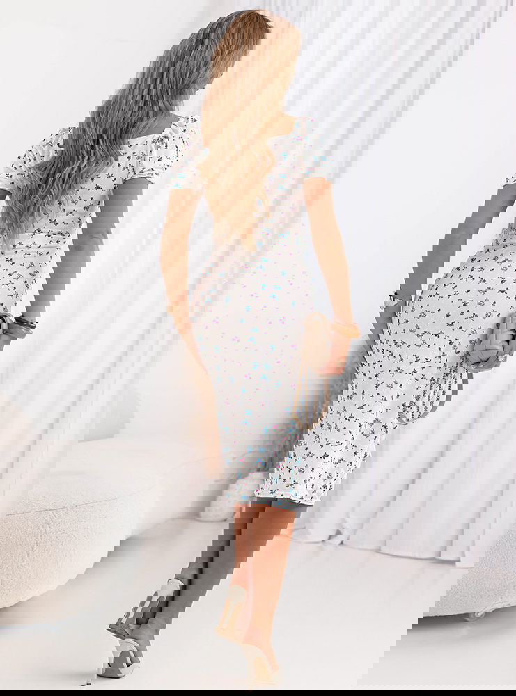 Wzorzysta sukienka z rozcięciem Disia...