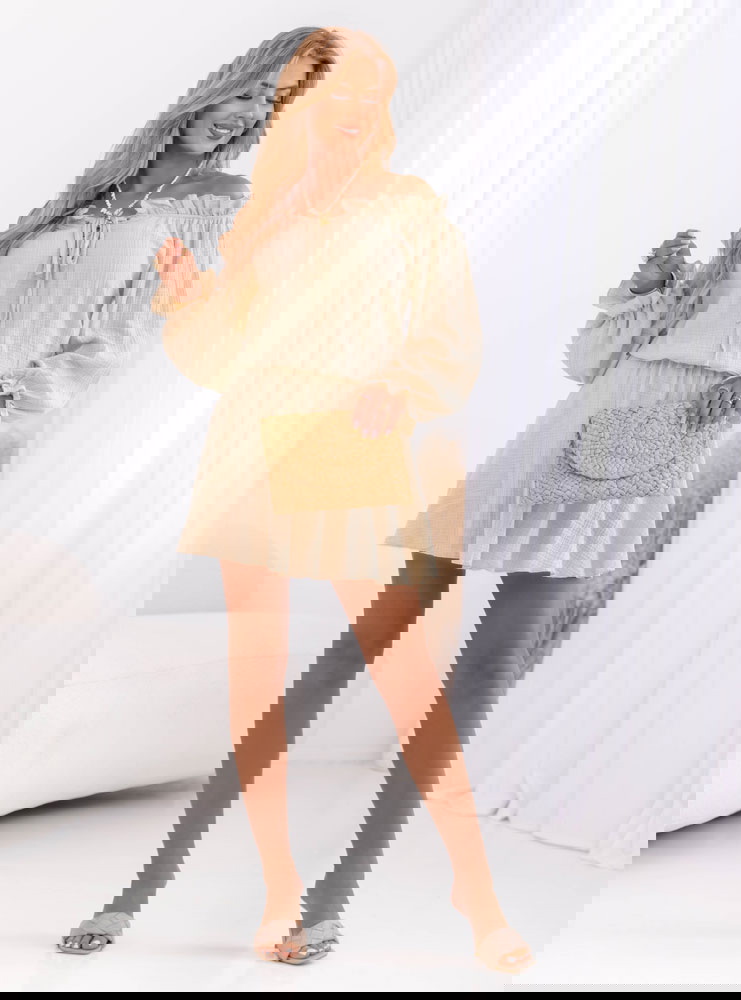 Beżowy muślinowy kombinezon jak...