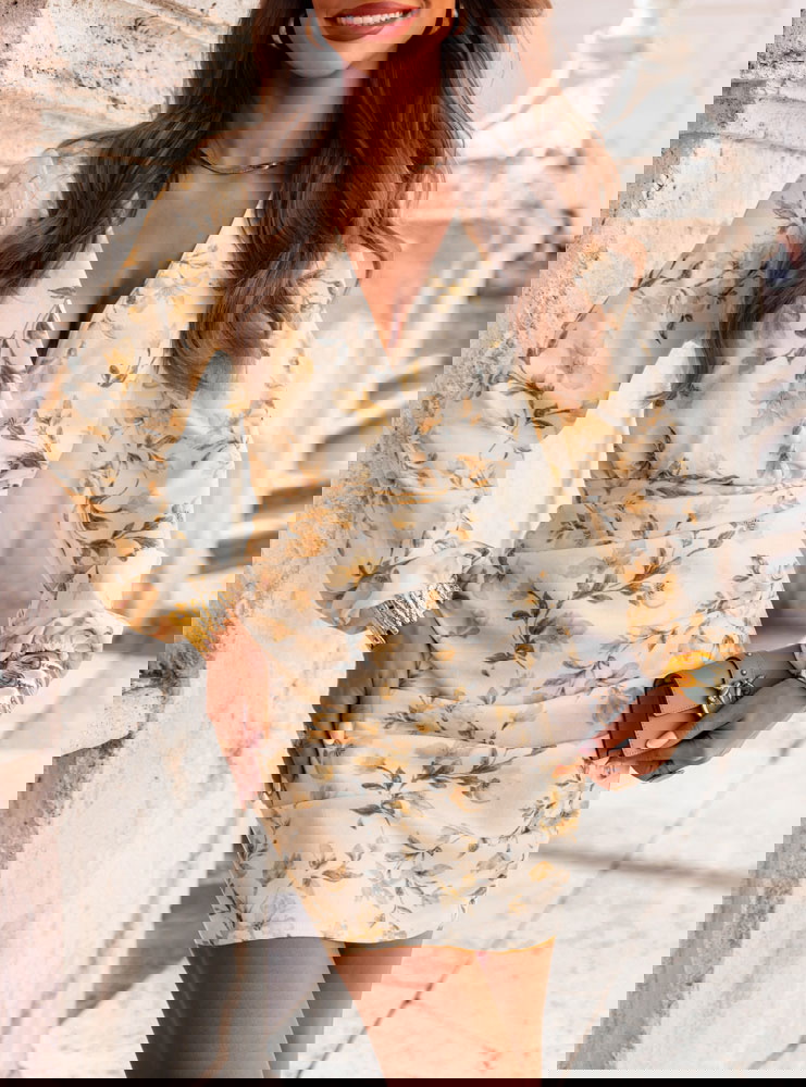 Wzorzysta sukienka z przekładanym...