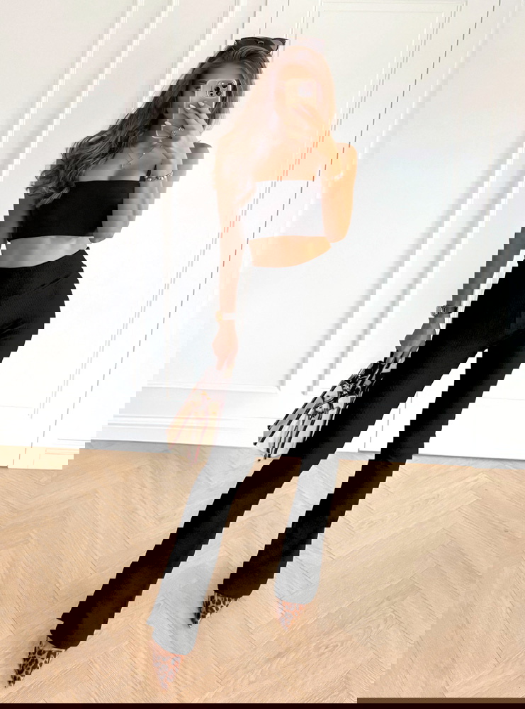 Czarne prążkowane spodnie z...