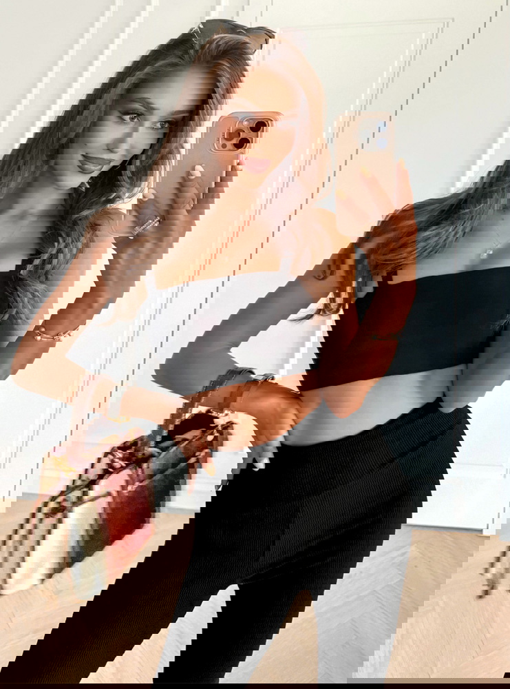 Czarne prążkowane spodnie z...