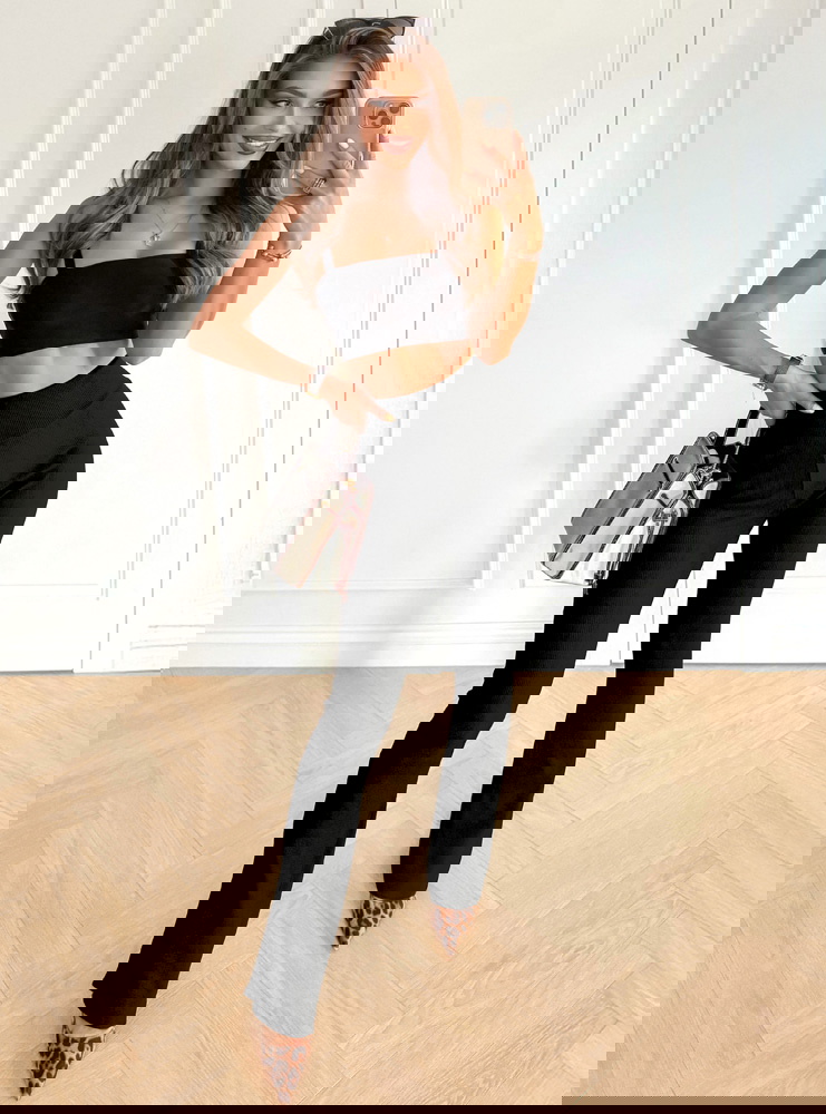 Czarne prążkowane spodnie z...