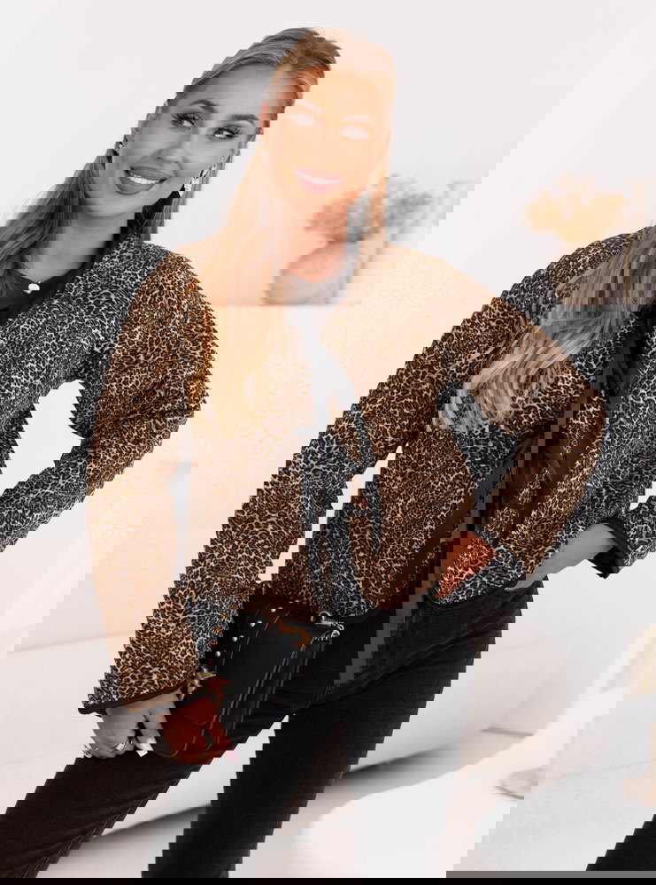 Lekka pikowana kurtka z wiązaniem w...