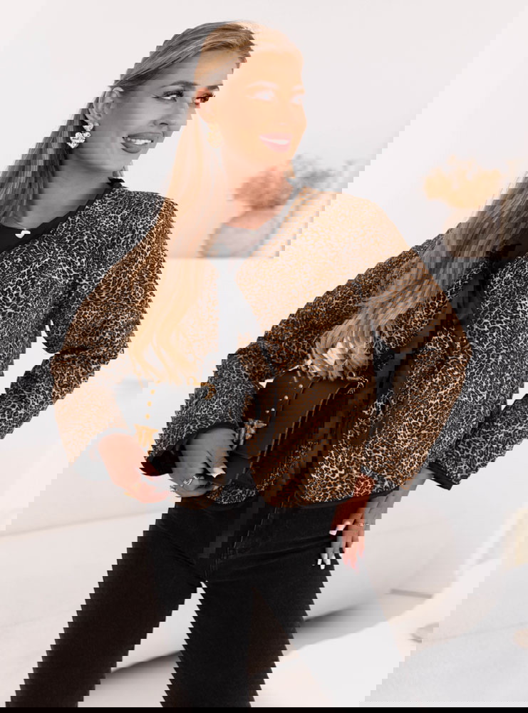 Lekka pikowana kurtka z wiązaniem w...