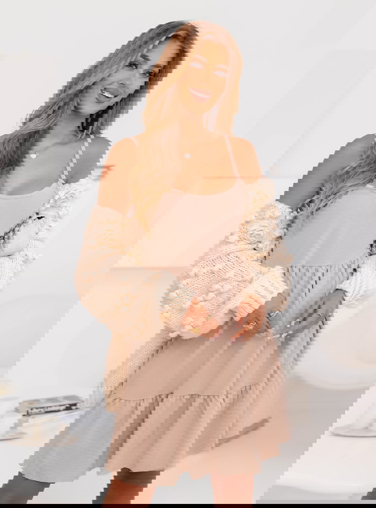 Beżowa rozkloszowana sukienka na...