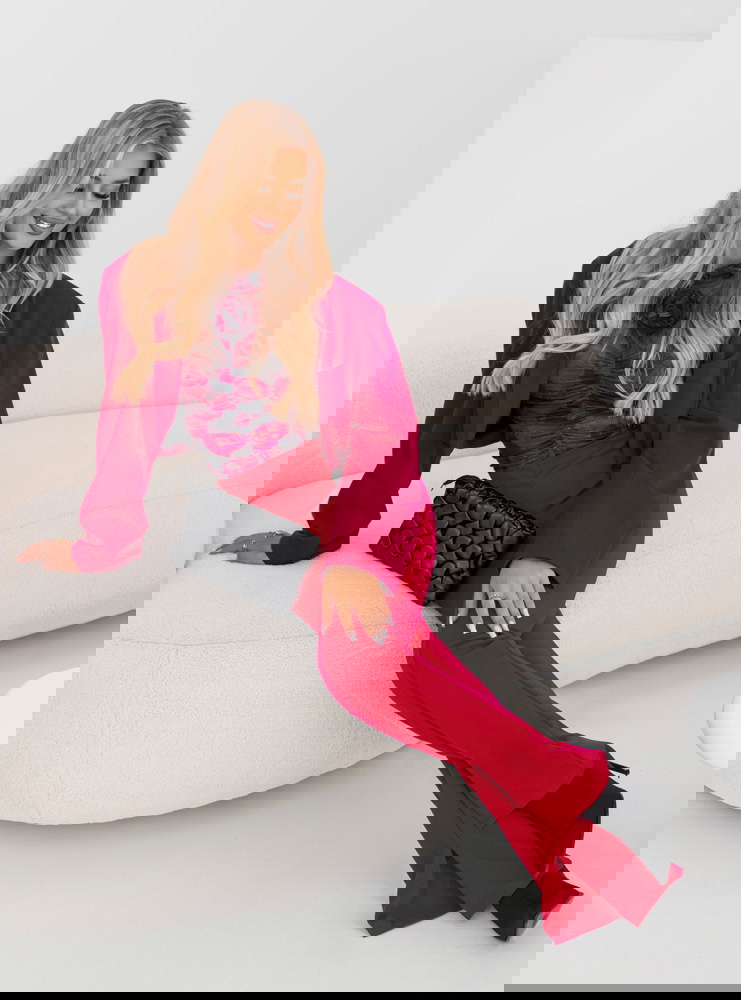 Malinowe spodnie typu dzwony z...