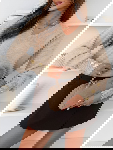 Beżowy sweter z ozdobnymi... 2