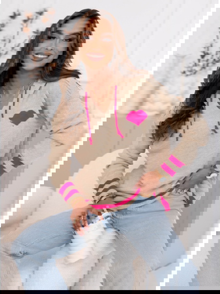 Beżowy sweter z kapturem...