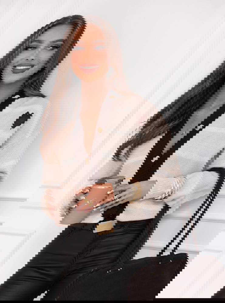 Sweter w paski zapinany na guziki...