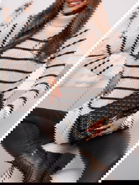 Beżowy sweter w paski...