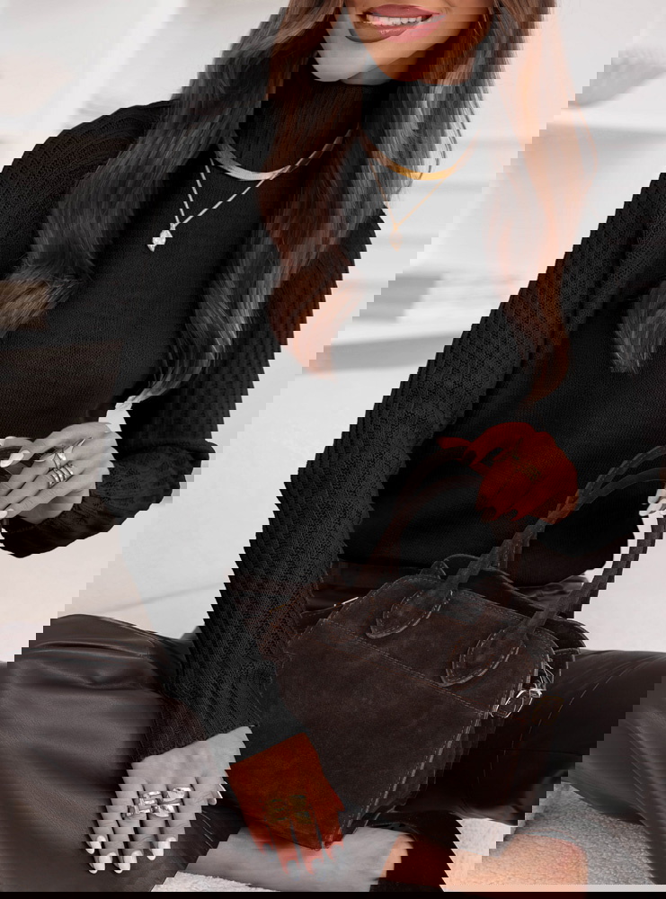 Czarny sweter z golfem Delonnee