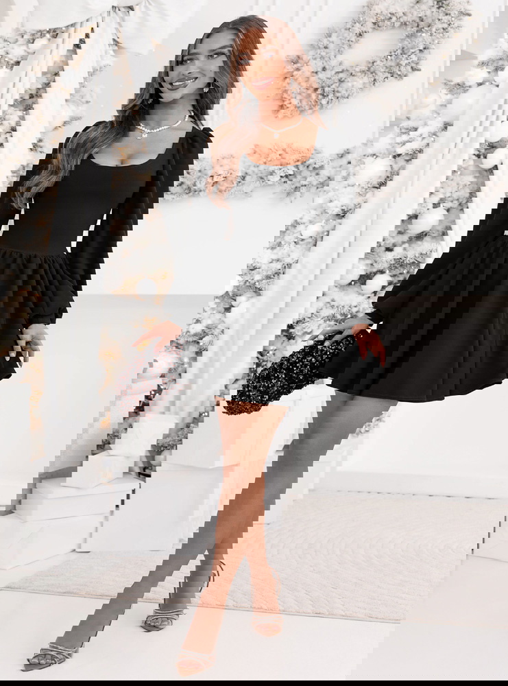 Czarna rozkloszowana sukienka z...