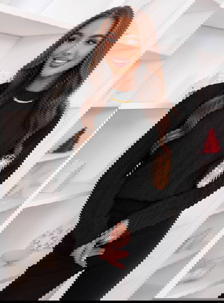 Czarny sweter z guzikami po boku Eudenia