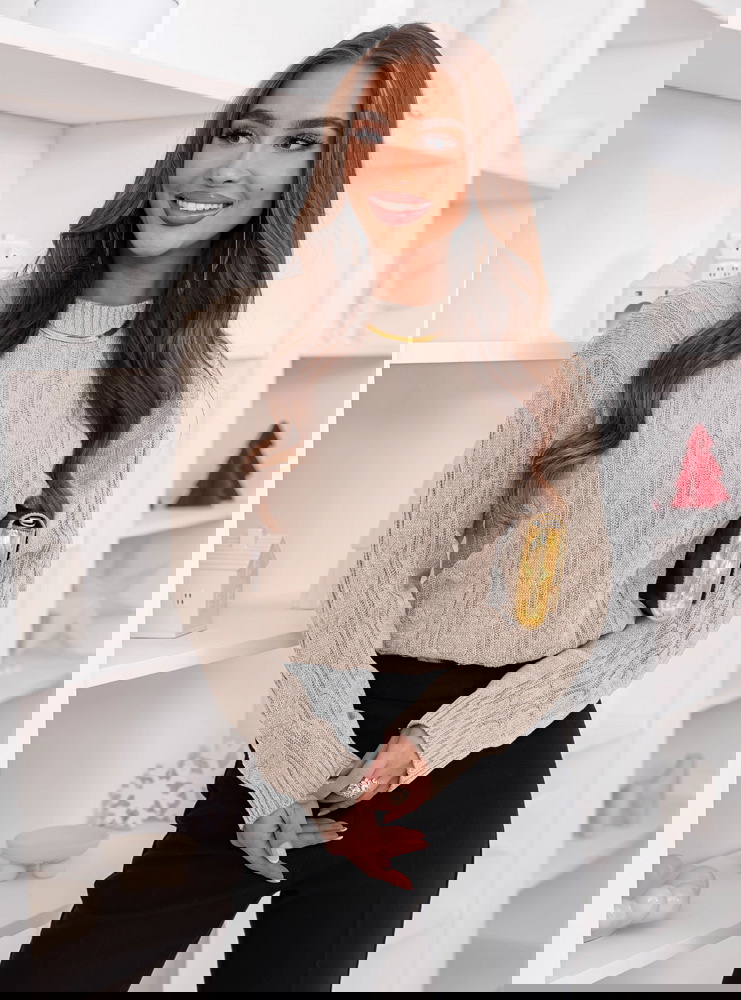 Beżowy sweter z guzikami po boku Eudenia