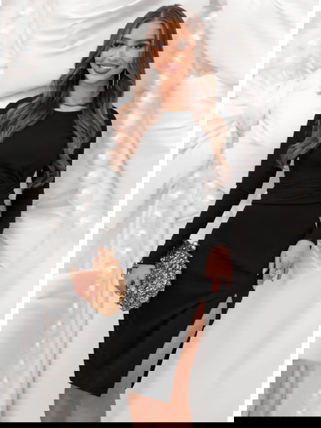 Czarna dopasowana sukienka... 2