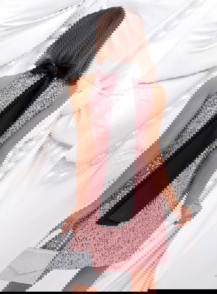 Cekinowa sukienka na święta z kokardą...