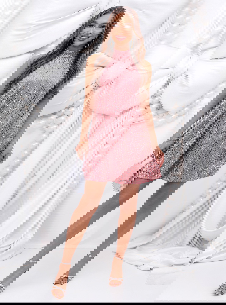 Cekinowa sukienka na święta z kokardą...