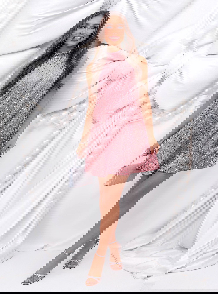 Cekinowa sukienka na święta z kokardą...