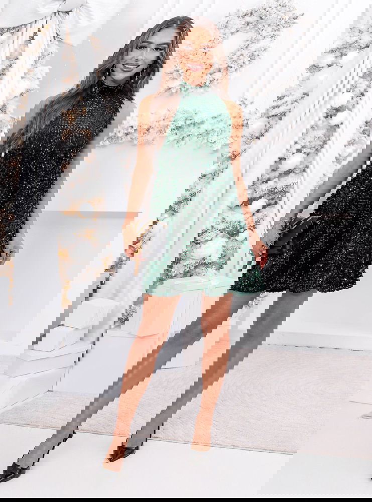 Cekinowa sukienka na święta z kokardą...