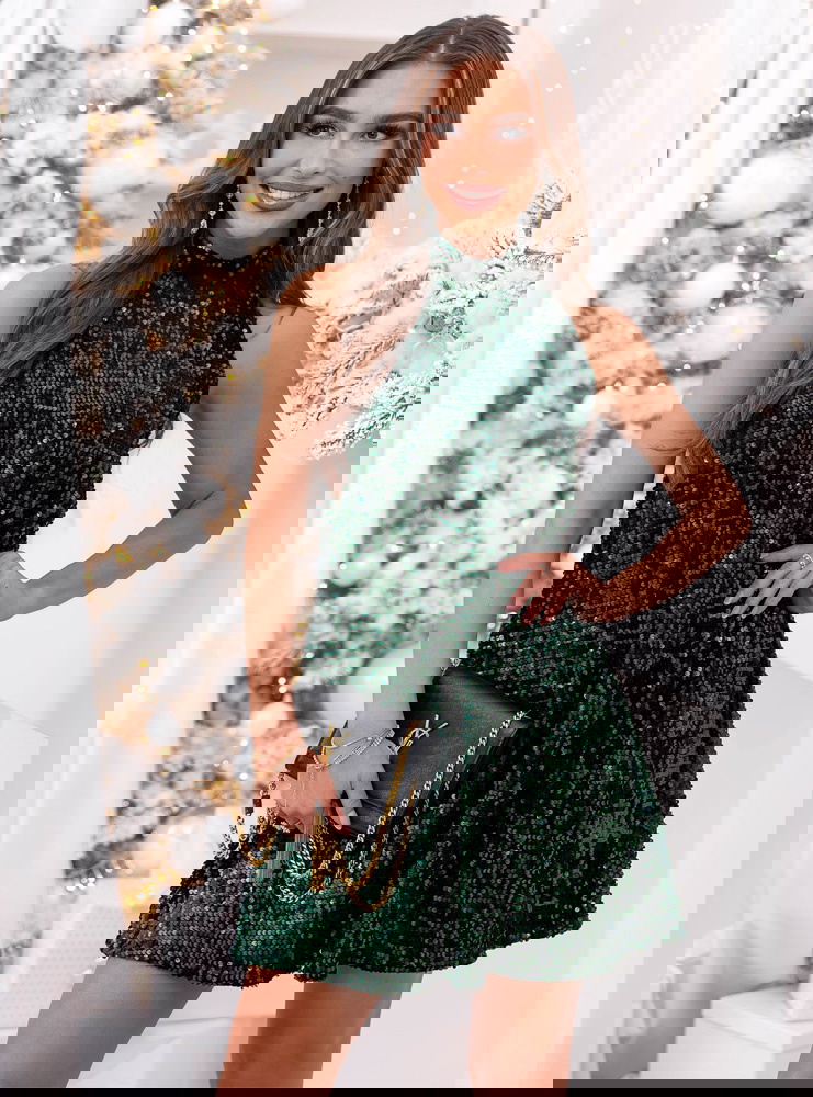 Cekinowa sukienka na święta z kokardą...