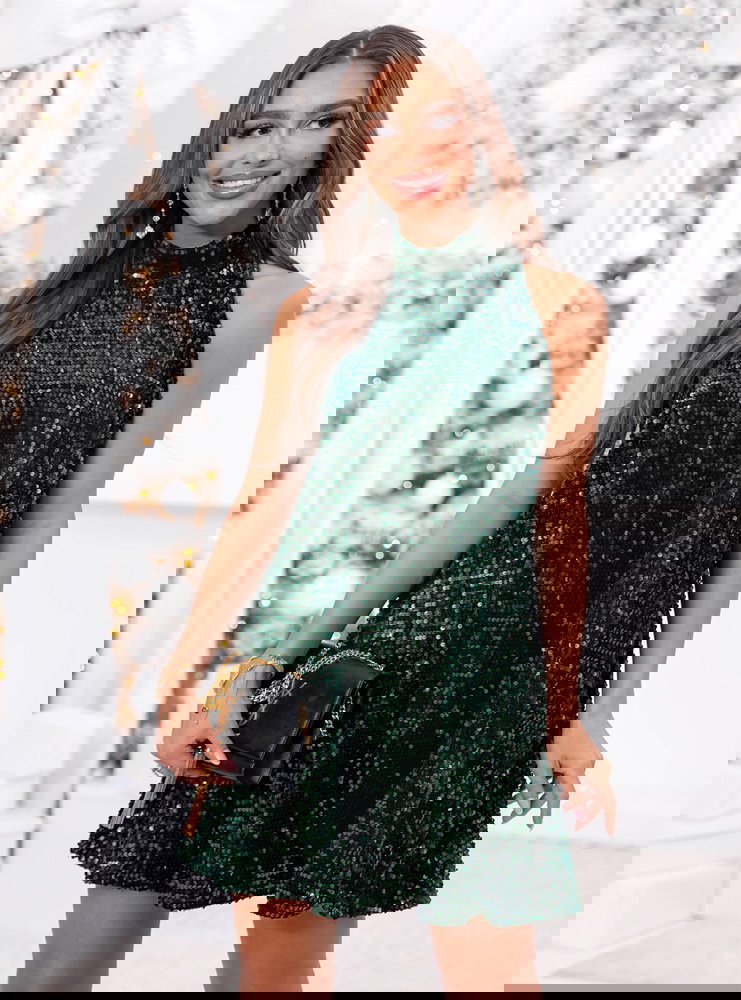 Cekinowa sukienka na święta z kokardą...