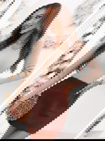 Beżowa prążkowana bluzka z...