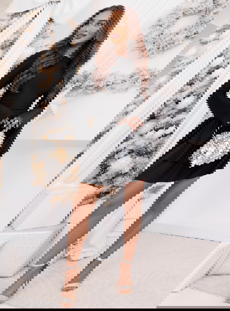 Czarny świąteczny kombinezon jak...