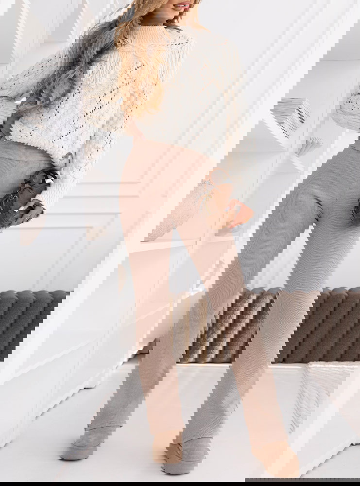 Beżowe prążkowane spodnie z...