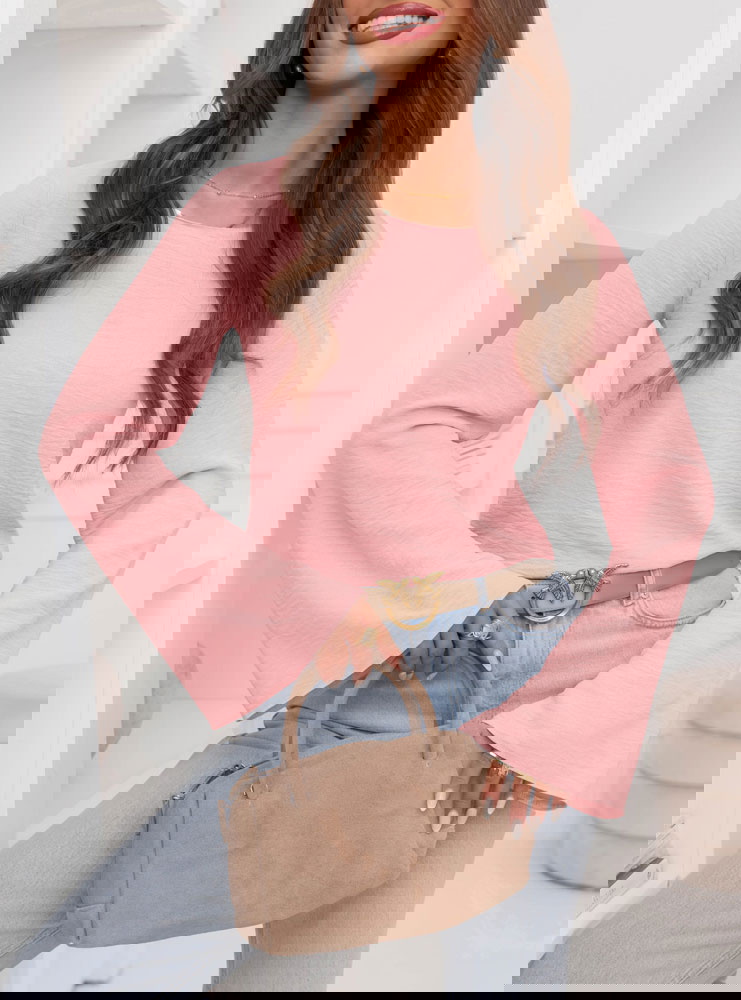 Pudrowa bluzka z szerokimi rękawami...