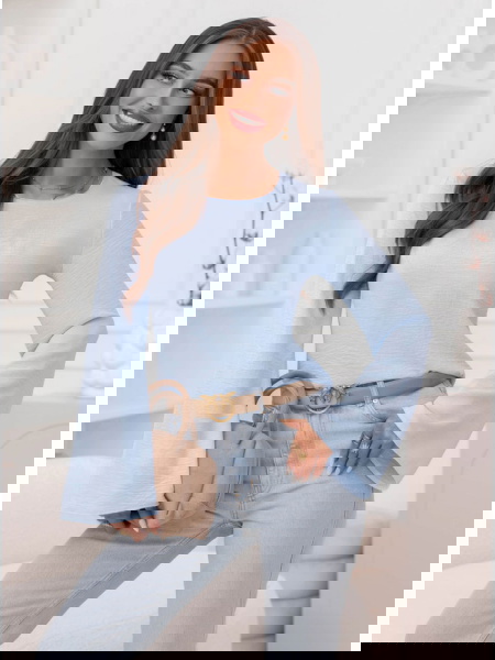 Błękitna bluzka z szerokimi...