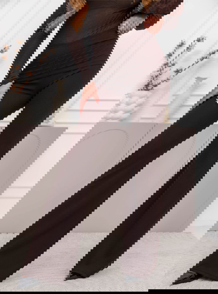 Czekoladowe spodnie z rozszerzanymi...