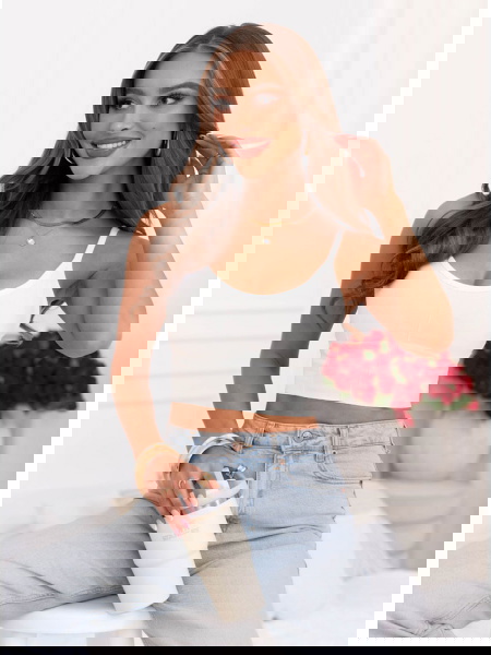 Biały biustonosz typu crop...