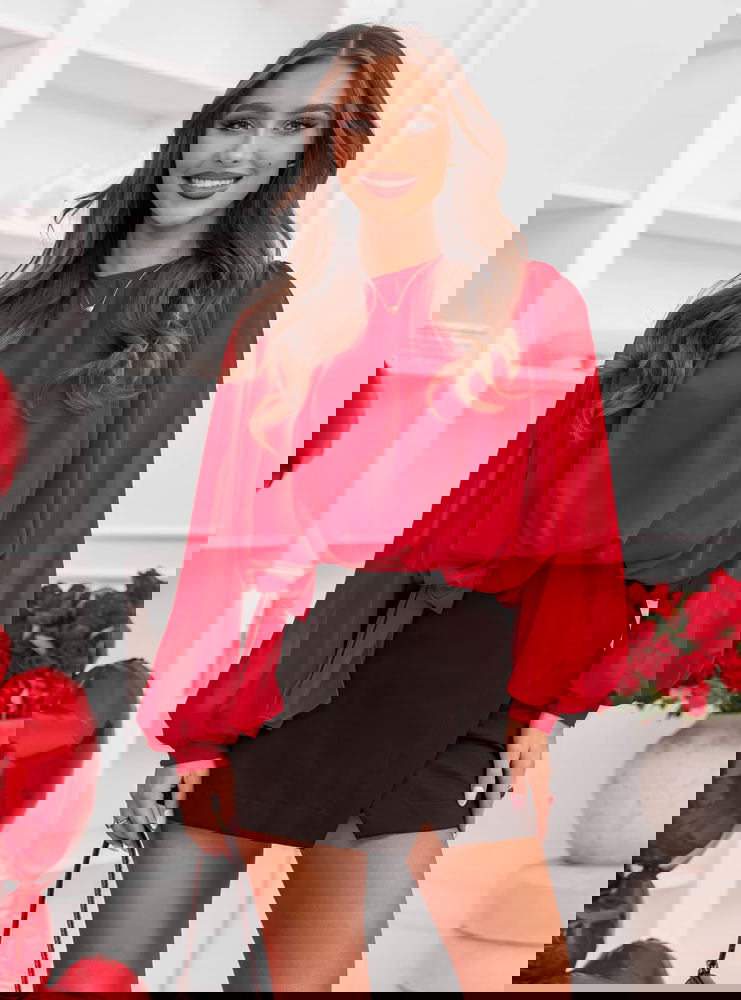 Malinowa bluzka z bufiastymi rękawami...