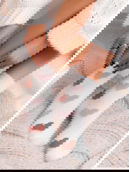 Białe skarpetki z ozdobnym...