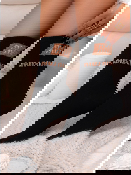 Czarne skarpetki z ozdobnym... 2