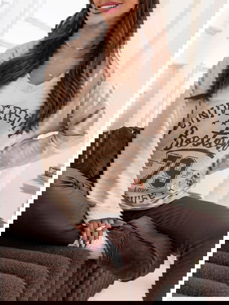 Beżowa bluzka z nadrukiem...