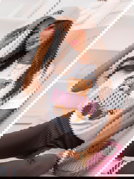 Biała bluzka z ozdobnym...