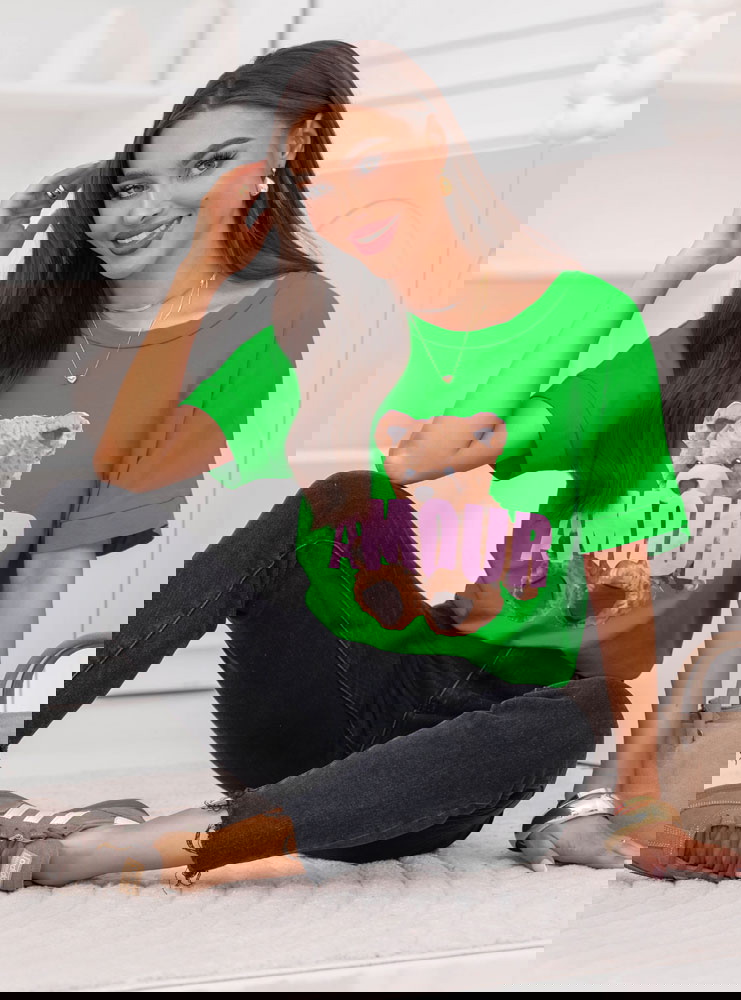 Zielona bluzka z ozdobnym nadrukiem...